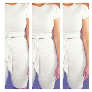 Tie top with high waisted shorts to match.